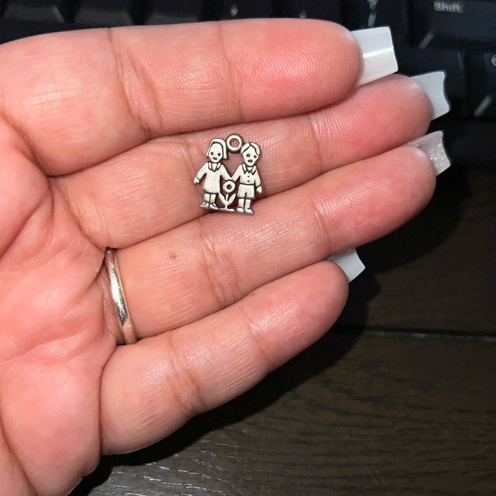 RETIRED Girl & Boy with Flower Charm